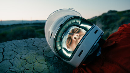 Astronaut With Helmet Sleeps At Night In New Uninhabited Planet