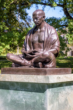 Geneva, Switzerland - September 3, 2020: A statue of Gandhi, offered by the Republic of India to the city of Geneva in 2007 for the first International Day of Non-Violence, in the Ariana park.