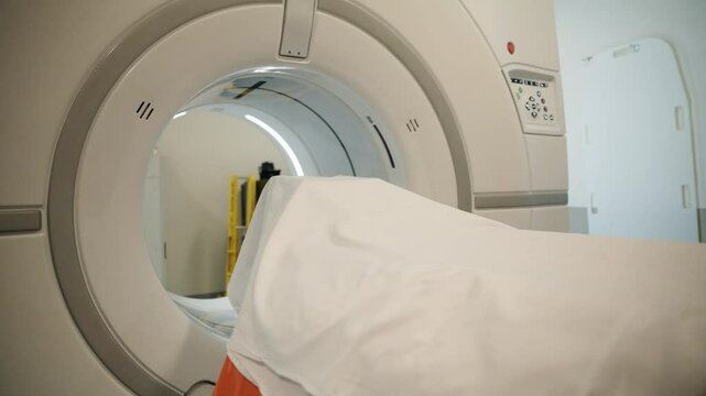 Mri machine moving in hospital, 4k pull away
