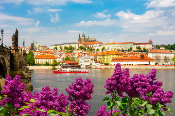 Spring Prague panorama with Hradcany castle and Charles bridge over Vltava river, Czech Republic