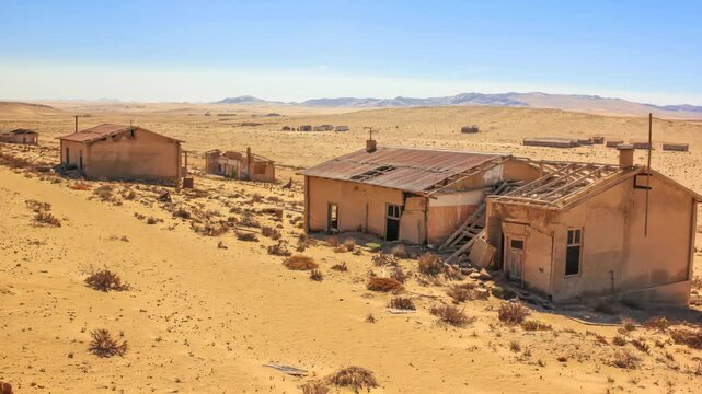 Kolmanskop, ghost towns in the area of the diamond mines, South Namibia, esterior of a house. Crumbling buildings stand as remnants of a bygone era in arid namibian deser. REAL PHOTO animated by AI