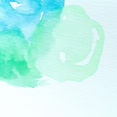 Watercolor abstract art blending blue and green tones in a soft, serene composition