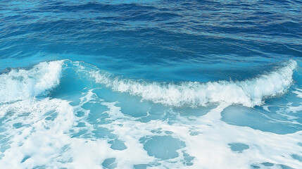 Fototapeta premium Pure blue turquoise water texture of the ocean sea with foam from and waves