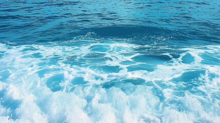 Obraz premium Pure blue turquoise water texture of the ocean sea with foam from and waves
