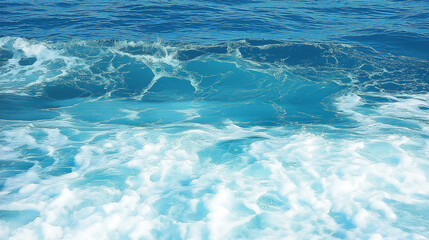 Pure blue turquoise water texture of the ocean sea with foam from and waves