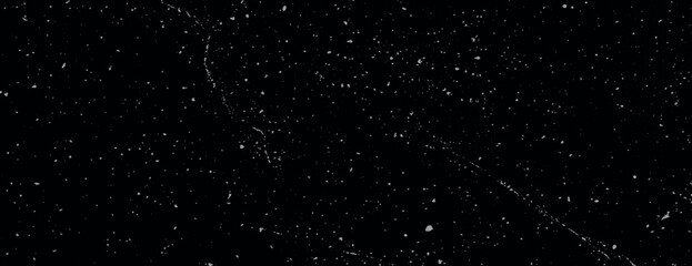 Starry black background, cosmic style. The background is black with white speckles. Textured background with a black and white color scheme. Minimal grainy speckled texture background vector
