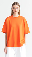 Mockup of a plain orange oversized t-shirt on a woman, ideal for branding and design