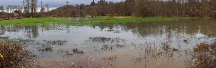 Normandy, France, Europe : Exterior photo view water floods due to climate change in fields creating damage disaster in agriculture environement