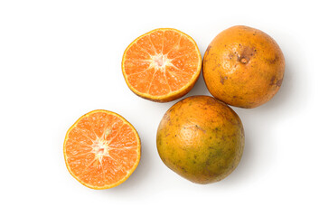 Flat lay of tangerine orange with cut in half  isolated on white background.