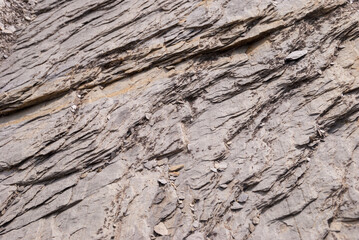 Layered rock in the Swiss Alps as background