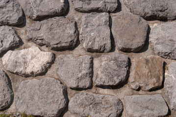 A fragment of stonework from the large natural stone