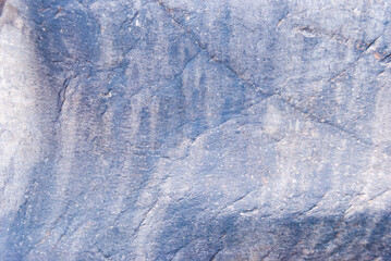 Smooth natural stone with unique surface texture and light streaks