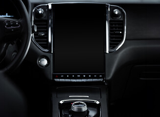 Fototapeta premium A black car dashboard with a black screen