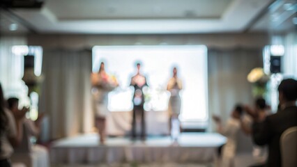 Business Award Ceremony Blur: A formal stage setting with blurred winners receiving awards and applause from attendees.
