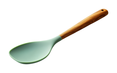 Cooking action with green silicone spatula and wooden handle kitchen utensil bright environment culinary concept isolated on transparent background png