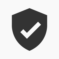 Shield icon with checkmark symbol vector