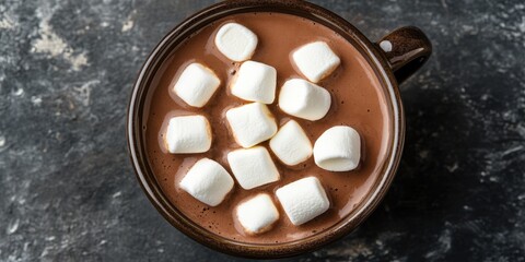 Horizontal top view of a delightful cup of cocoa topped with fluffy marshmallows, perfect for warming up on a chilly day, showcasing the rich texture of cocoa and the softness of marshmallows.