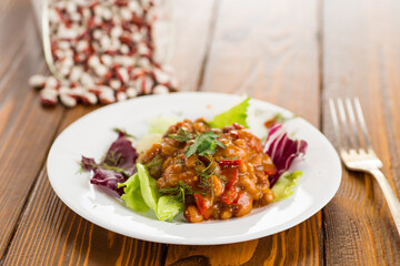 Delicious salad on a rustic table