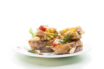 Appetizing toasts with aromatic cheese, isolated on a white background