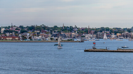 An elevated panorama view towards Goat Island across Narragansett bay at Newport, USA in the fall