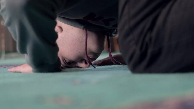 Muslim praying prostration mosque