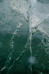 A stream of water with a lot of bubbles