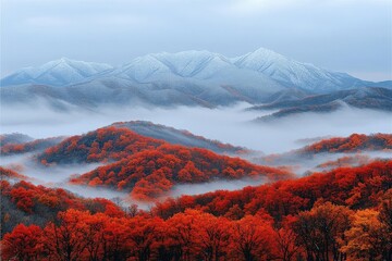 Fototapeta premium Misty Mountains in Autumn with Snow-capped Peaks