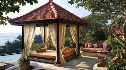 A luxurious outdoor cabana with flowing curtains, a daybed, and ocean views in the background