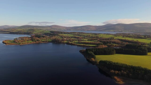 A serene aerial view of Blessington Lake and lush countryside in County Wicklow, Ireland