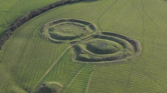 Mound of Hostages And Lia Fail (Stone of Destiny) At The Hill Of Tara In County Meath, Ireland. - aerial shot