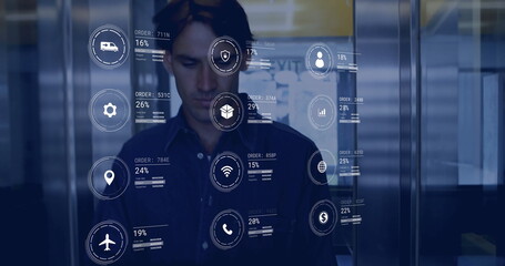Image of icons and data processing over caucasian man working in warehouse