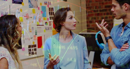 Image of financial data processing over diverse business people in office