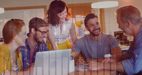 Image of financial data processing over diverse business people in office