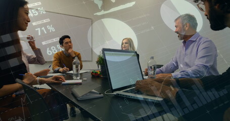 Image of financial data processing over diverse business people in office