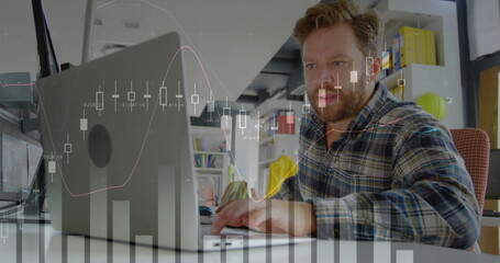 Image of financial data processing over caucasian businessman using laptop in office