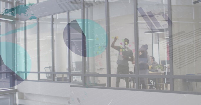 Image of financial data processing over diverse business people in office