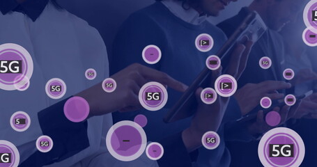 Image of 5g text and digital icons processing over diverse people using tablets