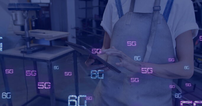 Image of 5g and 6g text and digital icons processing over caucasian woman using tablet