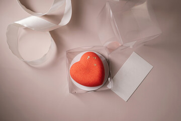 Heart shaped cake in a transparent box top view