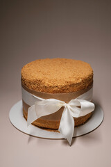 honey cake tied with white ribbon