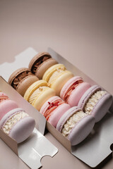 set of macarons in cardboard packaging
