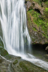 Fototapeta premium The Cascade d'Autoire waterfall in summer. A 30 meter high waterfall near Autoire in Lot Occitanie Southern France 