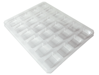 Transparent plastic PET thermoforming mold for assemble or equip in industrial automation, assembly line production. Modern and futuristic.
