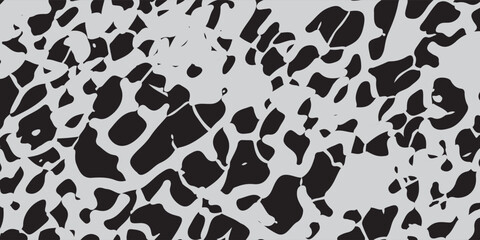 The grunge texture is black and white. Monochrome abstract background. Pattern of scratches, chips, and paint strokes. Black smudges, scuffing, wear and tear.