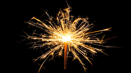 Sparkling firework against black background, celebrating New Year's Eve. Ideal for celebration cards