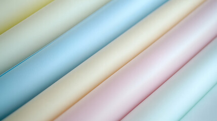Obraz premium Superficie de rollos de papel en tonos pastel dispuestos en diagonal