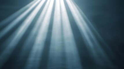 Obraz premium A serene image depicting soft beams of light breaking through a dark atmosphere, creating a tranquil and ethereal ambiance.