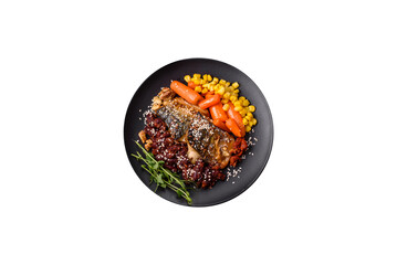 Grilled mackerel fillet pieces with vegetables, salt and spices