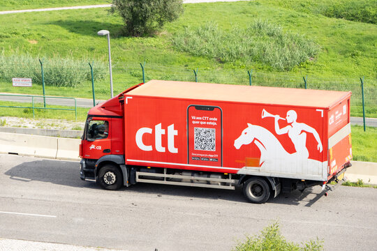 Ctt expresso truck driving on the road, delivering parcels and packages