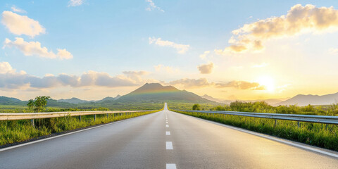 scenic road stretches towards mountain under bright sky